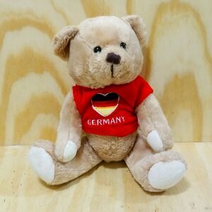 Teddy Bear in Oracle red T Shirt representing "Germany "